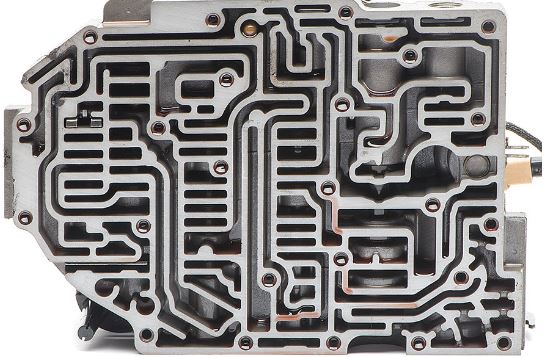 Virtually sludge-free automatic transmission valve body thanks to use of high-quality transmission fluid.