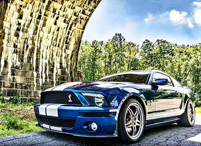 Car parked under bridge under the heat 